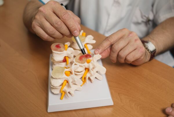 Neurosurgeon explaining surgeries to a patient.